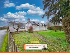 MAISON D’ARCHITECTE DE PLAIN-PIED SUR 80 M² AVEC GARAGE L'ENSEMBLE SUR 2339 M² DE TERRAIN CLOS