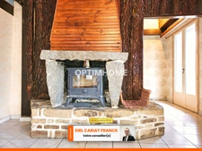 MAISON D’ARCHITECTE DE PLAIN-PIED SUR 80 M² AVEC GARAGE L'ENSEMBLE SUR 2339 M² DE TERRAIN CLOS