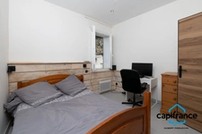 Appartement atypique de 86 m2 avec une terrasse privative de 50 m2 sur les toits 4 chambres, 2 places de parking.