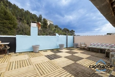 Appartement atypique de 86 m2 avec une terrasse privative de 50 m2 sur les toits 4 chambres, 2 places de parking.