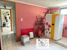 Maison individuelle avec sous-sol complet – 130 m² – Terrain 9 ares – Secteur recherché