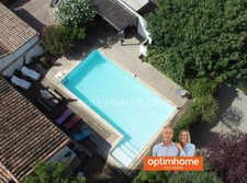 Maison avec rendement locatif, piscine et garage