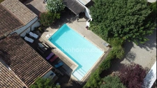 Propriété avec rendement locatif, piscine et garage