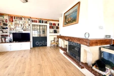 Maison avec rendement locatif, piscine et garage