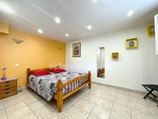 Maison avec rendement locatif, piscine et garage