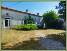 ensemble de 2 maisons en pierre + grange + grand terrain 