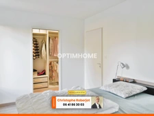 Maison de plain pied avec 3 chambres posée sur 1000m2 - RT 2012