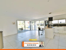 Maison de plain pied avec 3 chambres posée sur 1000m2 - RT 2012