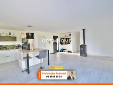 Maison de plain pied avec 3 chambres posée sur 1000m2 - RT 2012