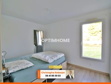 Maison de plain pied avec 3 chambres posée sur 1000m2 - RT 2012
