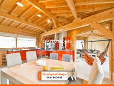 Inédit et rare sur le département: Maison de 220m2 en bois massif sur 2610m2 de terrain clos de murs