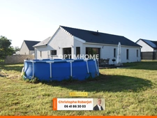 Maison de plain pied avec 3 chambres posée sur 1000m2 - RT 2012