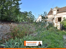 Maison de ville à rénover avec jardin – proche centre-ville