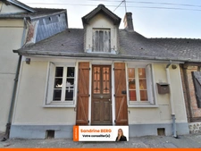 Maison de ville à rénover avec jardin – proche centre-ville