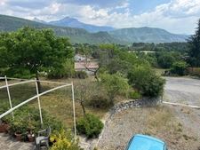 Maison 137 m² + T2 indépendant | 4 chambres | 3 SDB | Double garage | Terrain 1 497 m² | Vue exceptionnelle
