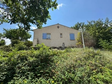 Maison 137 m² + T2 indépendant | 4 chambres | 3 SDB | Double garage | Terrain 1 497 m² | Vue exceptionnelle