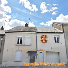 Maison à rénover de 181m², 4 chambres avec terrasse couverte et grand terrain.