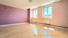 Maison à rénover de 181m², 4 chambres avec terrasse couverte et grand terrain.