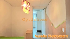 Maison à rénover de 181m², 4 chambres avec terrasse couverte et grand terrain.