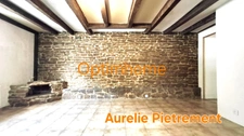Maison à rénover de 181m², 4 chambres avec terrasse couverte et grand terrain.