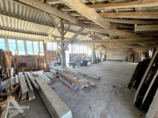 Propriété à fort potentiel – Hangars & bâtiments – 450 m² exploitables sur 15 000 m² de terrain aménageable – Changement de destination possible