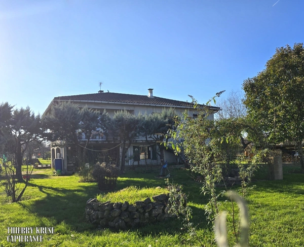 Maison familiale de 109 m² sur grand terrain arboré. Sous-sol complet. Quartier calme à Montauban.