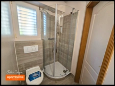 Maison de 126 m² avec 5 chambres, 2 garages, cour intérieure et jardin à Cessy centre