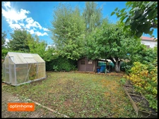 Maison individuelle avec 3 chambres, un jardin, un garage fermé et un parking