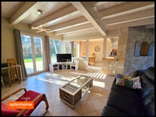 Maison de 126 m² avec 5 chambres, 2 garages, cour intérieure et jardin à Cessy centre
