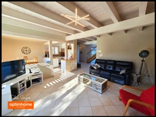 Maison de 126 m² avec 5 chambres, 2 garages, cour intérieure et jardin à Cessy centre