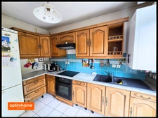 Maison individuelle avec 3 chambres, un jardin, un garage fermé et un parking