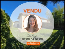 Maison de 126 m² avec 5 chambres, 2 garages, cour intérieure et jardin à Cessy centre