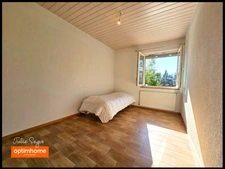Maison de 126 m² avec 5 chambres, 2 garages, cour intérieure et jardin à Cessy centre