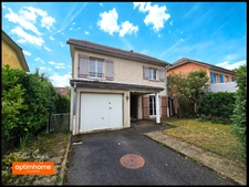 Maison individuelle avec 3 chambres, un jardin, un garage fermé et un parking