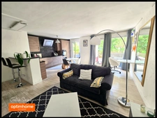 T3 Cessy centre en rez-de-jardin avec terrasse de 57 m², garage, cave et parking