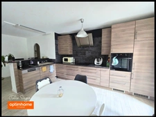T3 Cessy centre en rez-de-jardin avec terrasse de 57 m², cave et parking