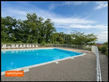 Appartement T2 Gex en rez-de-jardin avec cave et 2 Parkings sécurisés et accès piscine 