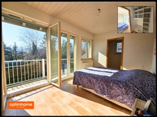 Maison de 126 m² avec 5 chambres, 2 garages, cour intérieure et jardin à Cessy centre