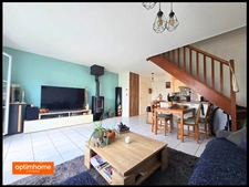 Maison avec 3 chambres, un jardin, deux parkings et un garage fermé.