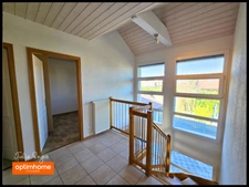 Maison de 126 m² avec 5 chambres, 2 garages, cour intérieure et jardin à Cessy centre