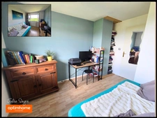 Maison avec 3 chambres, un jardin, deux parkings et un garage fermé.