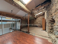 A vendre maison en pierre - a rénover - potentiel 140m² + garage + terrasse 16.7m² - Bettant