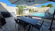 MAISON FAMILIALE AVEC JARDIN ET PISCINE CHAUFFÉE