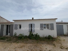 CHARMANTE MAISON RÉTAISE AVEC JARDIN CLOS ET TERRASSE ET  GARAGE AU CŒUR DE LOIX