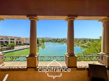 DERNIER ETAGE EN ANGLE CLIMATISE avec VUE PANORAMIQUE SUR LE LAC, BELLE EXPOSITION, appartement de 34 m2 +2 mezzanines   soit 45 m2 de surface utile  2 chambres  place de parking, cave et local vélos 