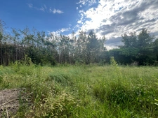Building plot of 639 m2, marked out, free builder, flat and sunny, village center, not serviced.