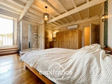 Authentic 118 m2 stone village house, air-conditioned, 50 m2 terrace, outdoor kitchen, double garage, attic, three beautiful bedrooms, 2 bathrooms, laundry room  