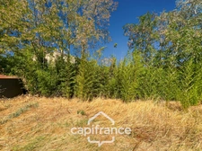 Building plot of 639 m2, marked out, free builder, flat and sunny, village center, not serviced.