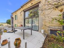 Maison en pierre de 179 m² entièrement rénovée avec jardin et terrasse 