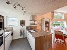 MAISON ATYPIQUE DE 80 M² SUR PLUS DE 1 000 M² DE TERRAIN